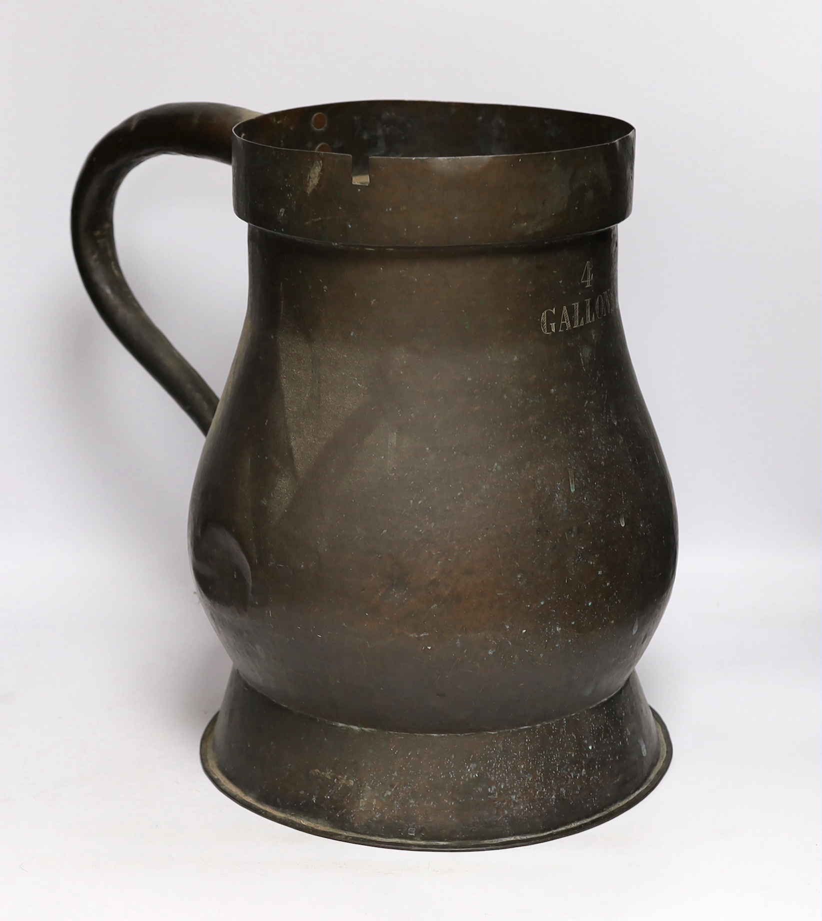 A 19th century large 4 gallon copper measuring jug, 38.5cm high